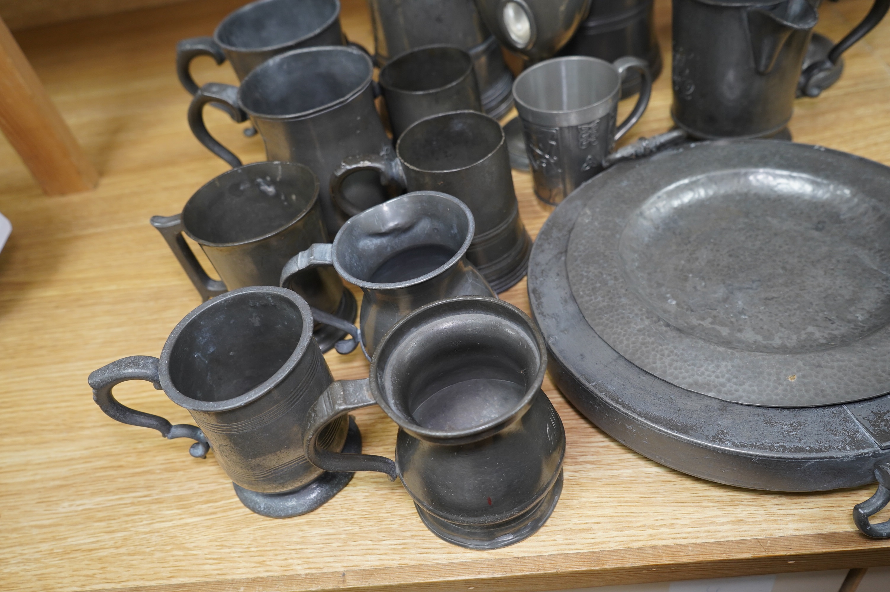 A collection of various pewter tankards, jugs etc. Condition - varies